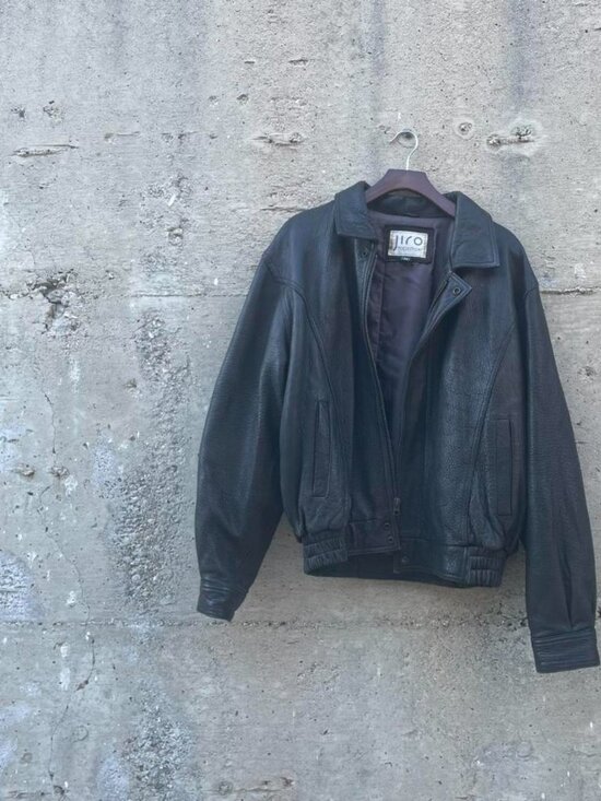 Vintage black leather bomber jacket